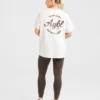 „Body Achieve Mind Believe“ Oversize-T-Shirt